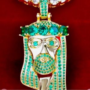 Jesus pendant, green rubies, and gold frame pendant